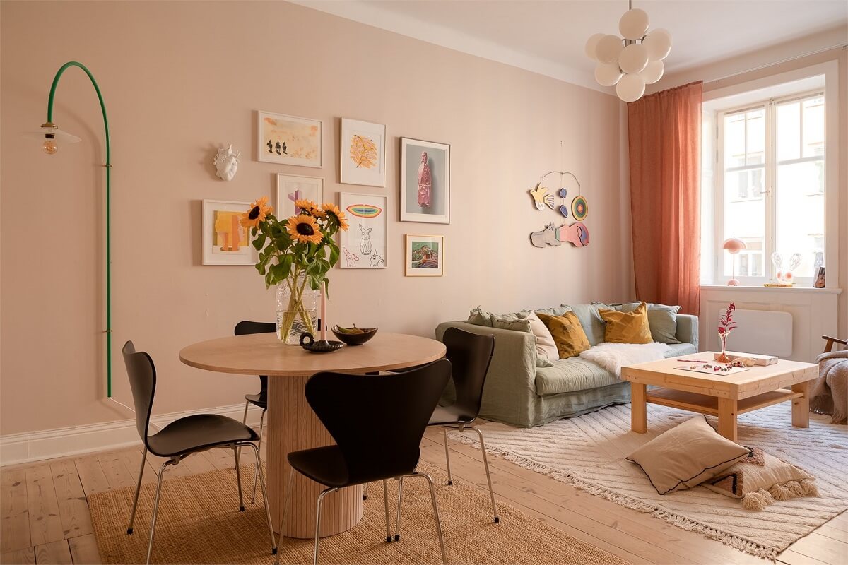 Nature-Inspired Colors in a Charming Stockholm Apartment 6 living room terracotta curtains round dining table