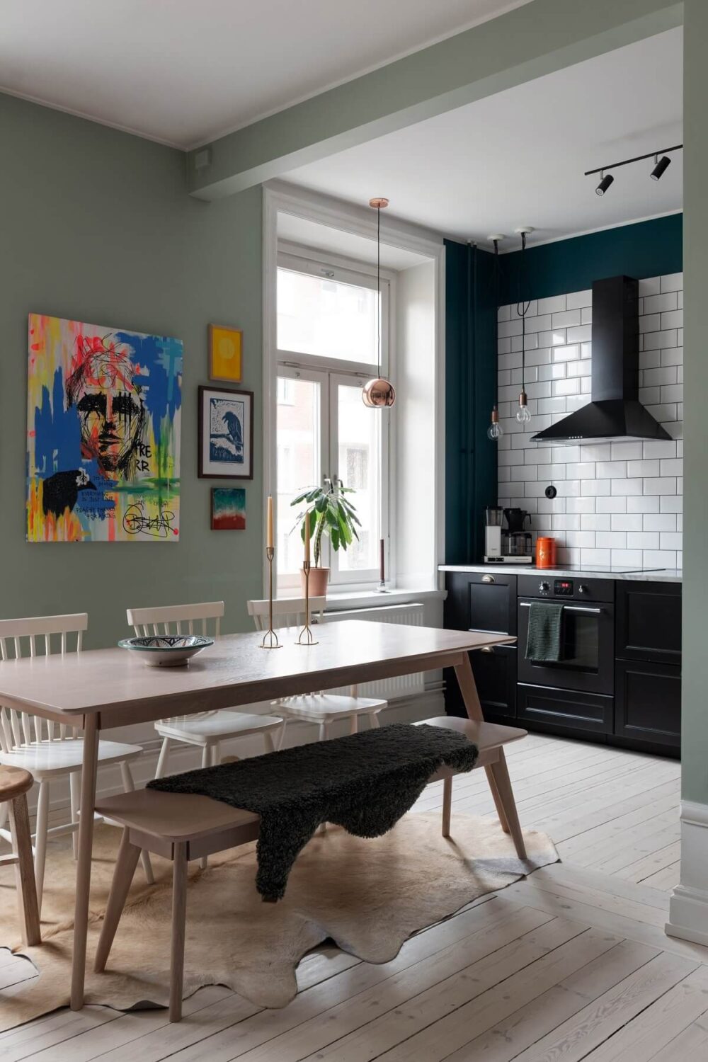 Colorful Art and Furniture in a Stylish Scandi Apartment 12 open plan living space dining table