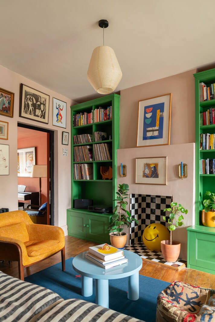 Best of 2024: Living Rooms 6 colorful living room striped sofa green built in bookcases