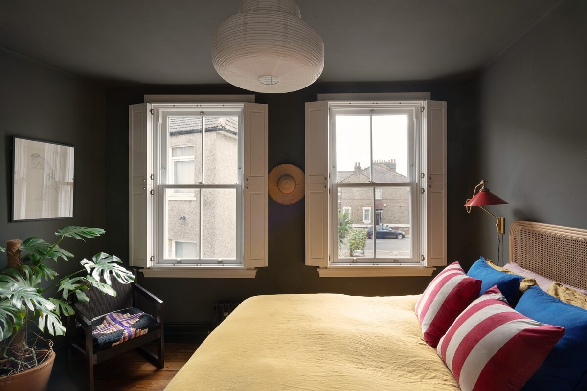 Colorful Rooms and Period Features in a London Terrace House 12 dark gray color drenched bedroom