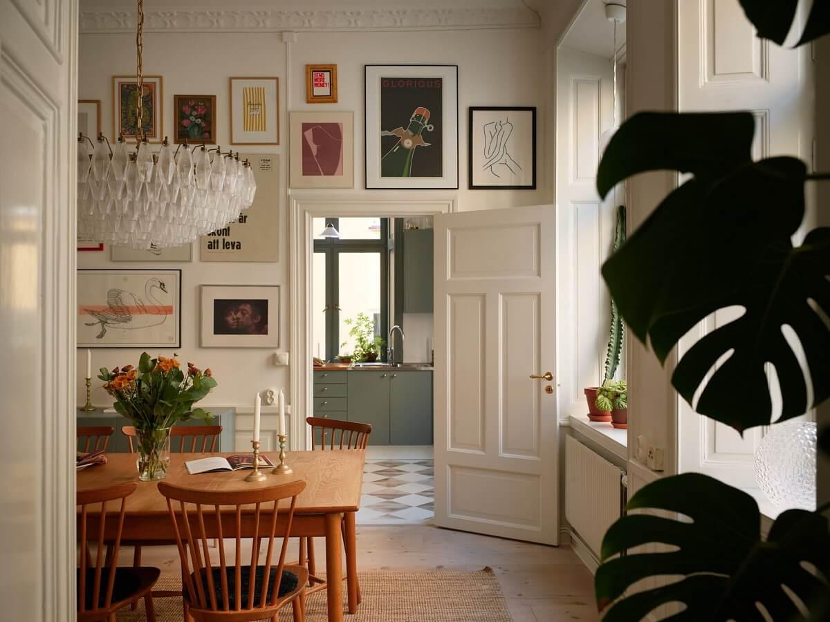 dining room wooden table gallery wall