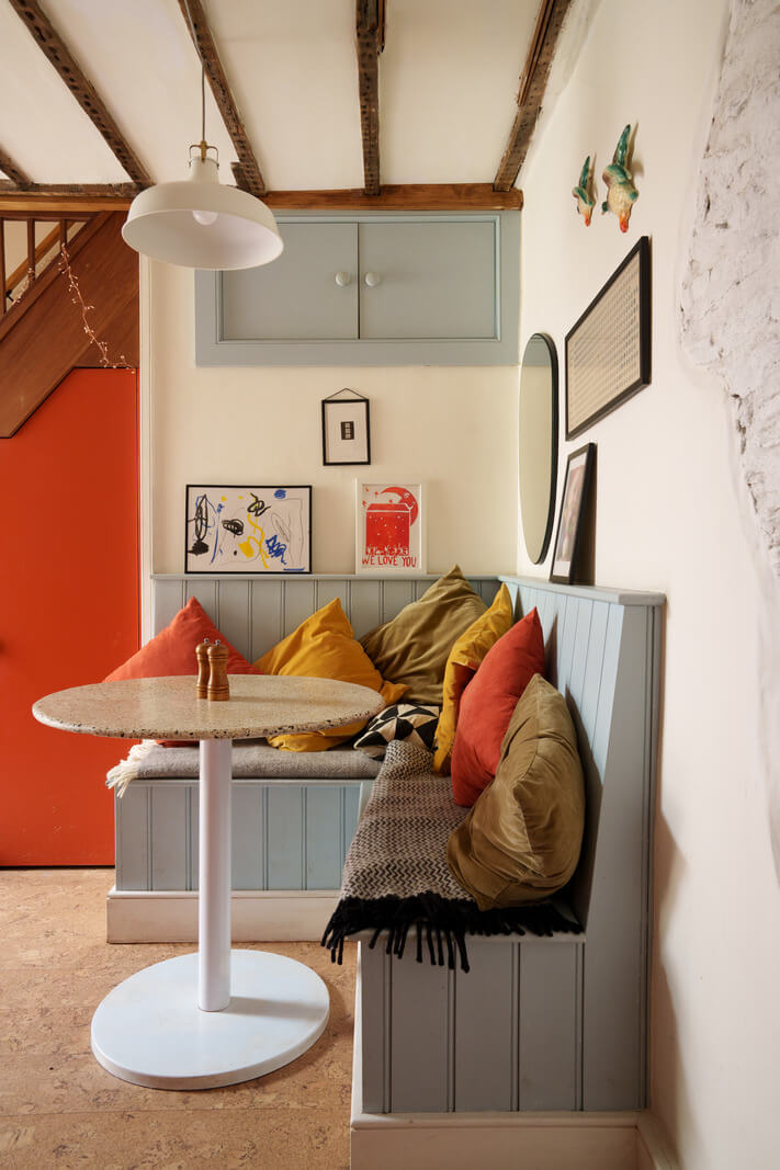 Colorful Furniture in a Historic English Cottage 5 kitchen table built in seating