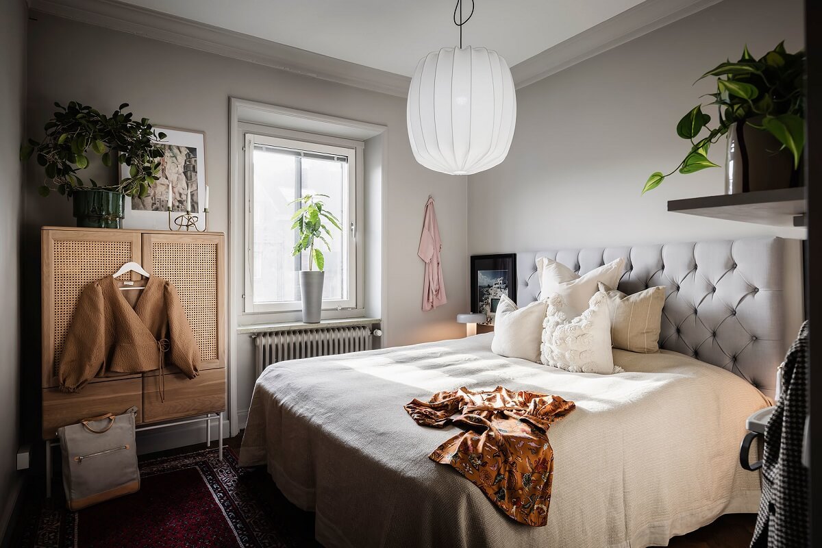 A Burgundy Kitchen in a Stylish Scandinavian Apartment 19 light gray bedroom