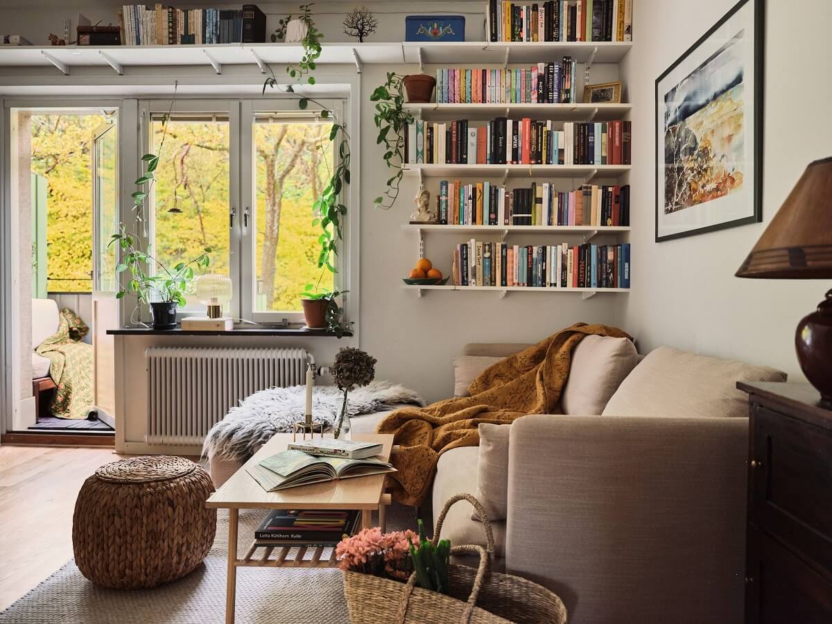 living room with bookshelves above window