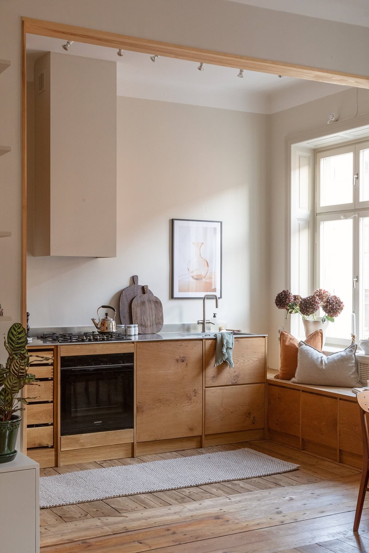scandi wooden kitchen with window seat nordroom