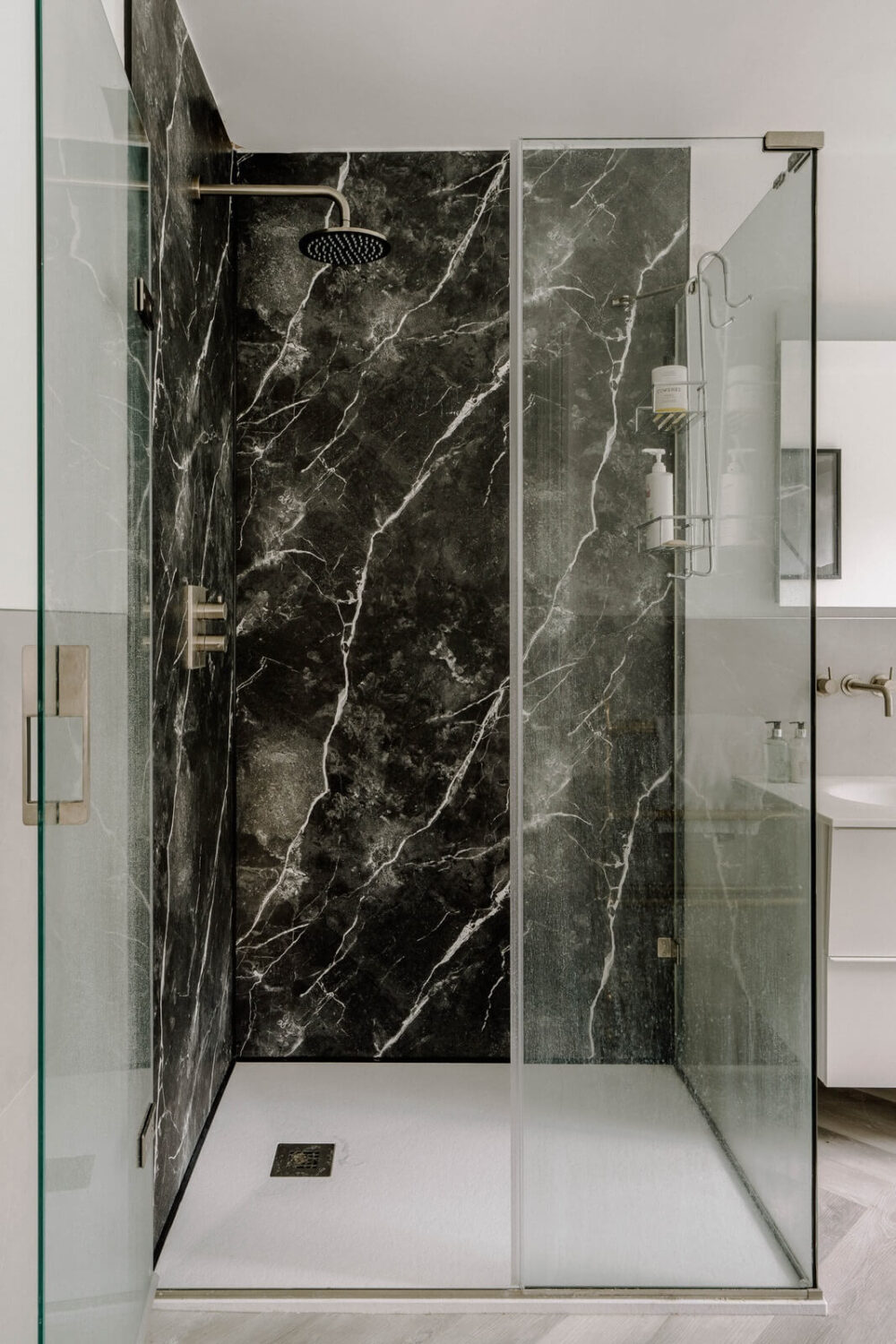 A Grand Arts and Crafts House in London 16 shower black marble A Grand Arts and Crafts House in London