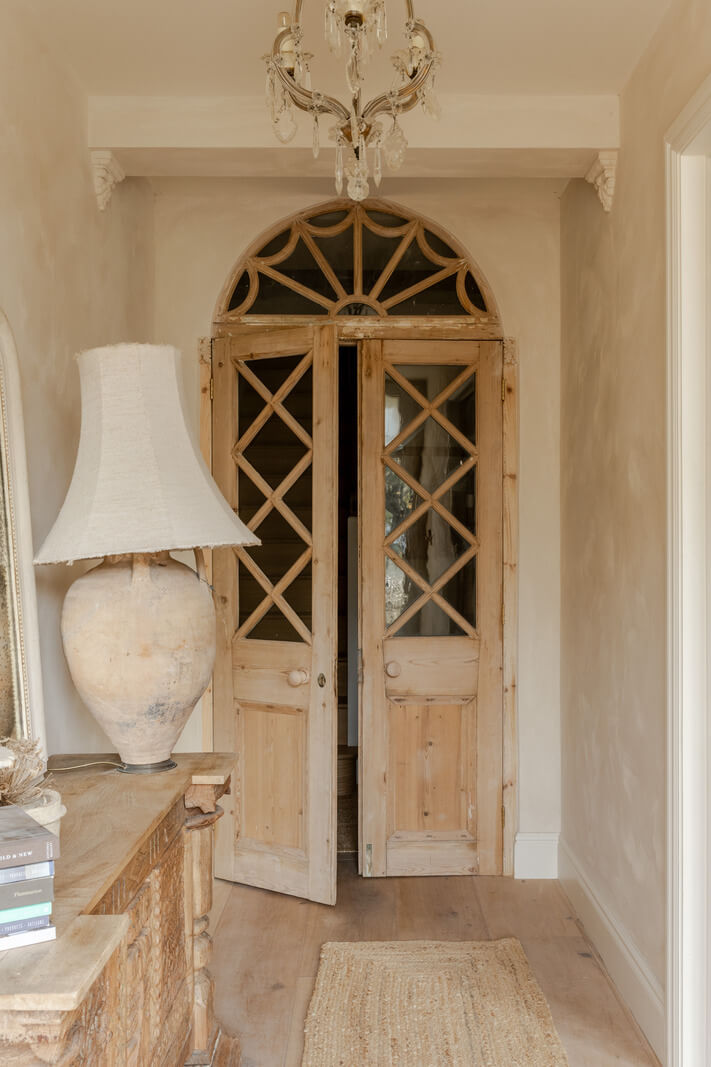 Limewash Walls and Restored Period Features in a Calm English Home 9 wooden glass doors with arched window