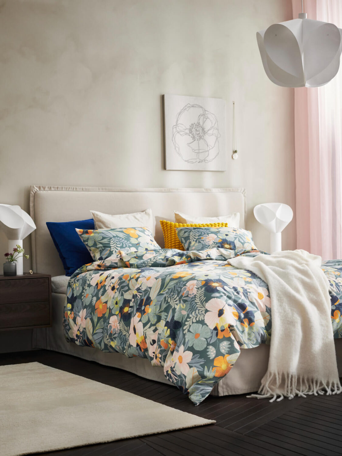 IKEA Catalogue 2026 + New IKEA Collections 33 ikea bedroom with floral bedding and neutral textile headboard