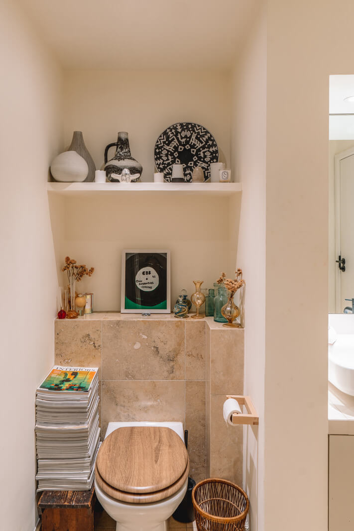 A Charming Garden Apartment in North Kensington 17 bathroom with shelf above toilet