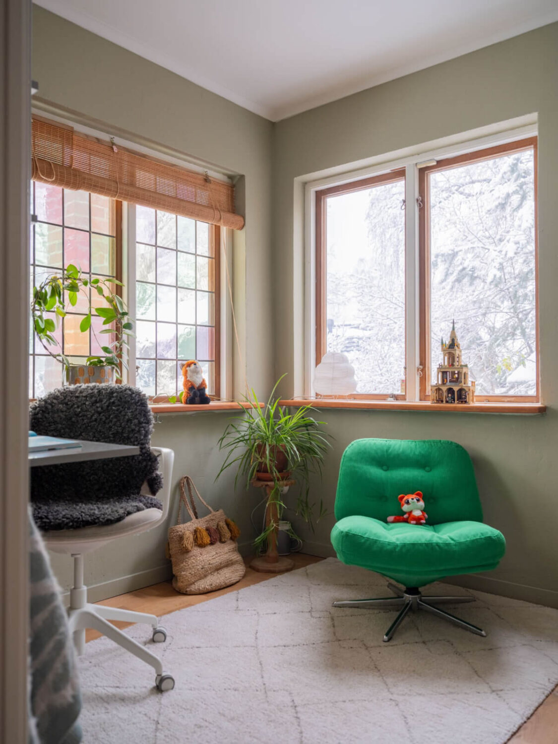 A Beautiful Midcentury Family Home South of Stockholm 25 bedroom with desk and green ikea swivel chair