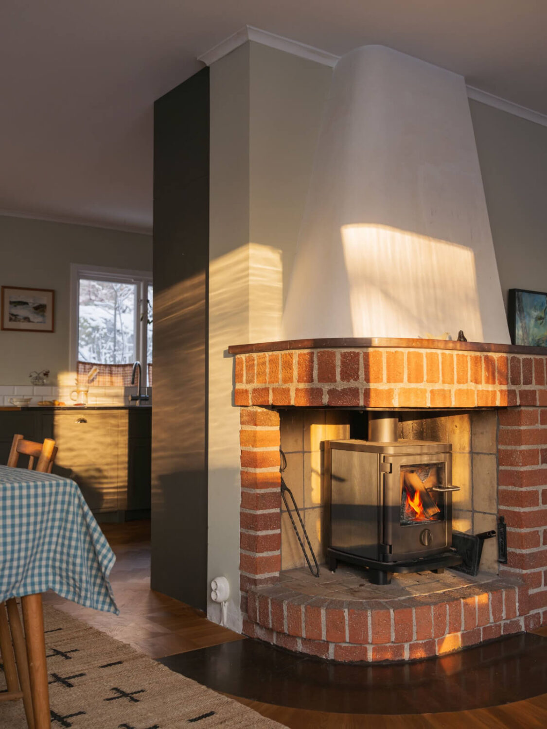 A Beautiful Midcentury Family Home South of Stockholm 11 brick fireplace