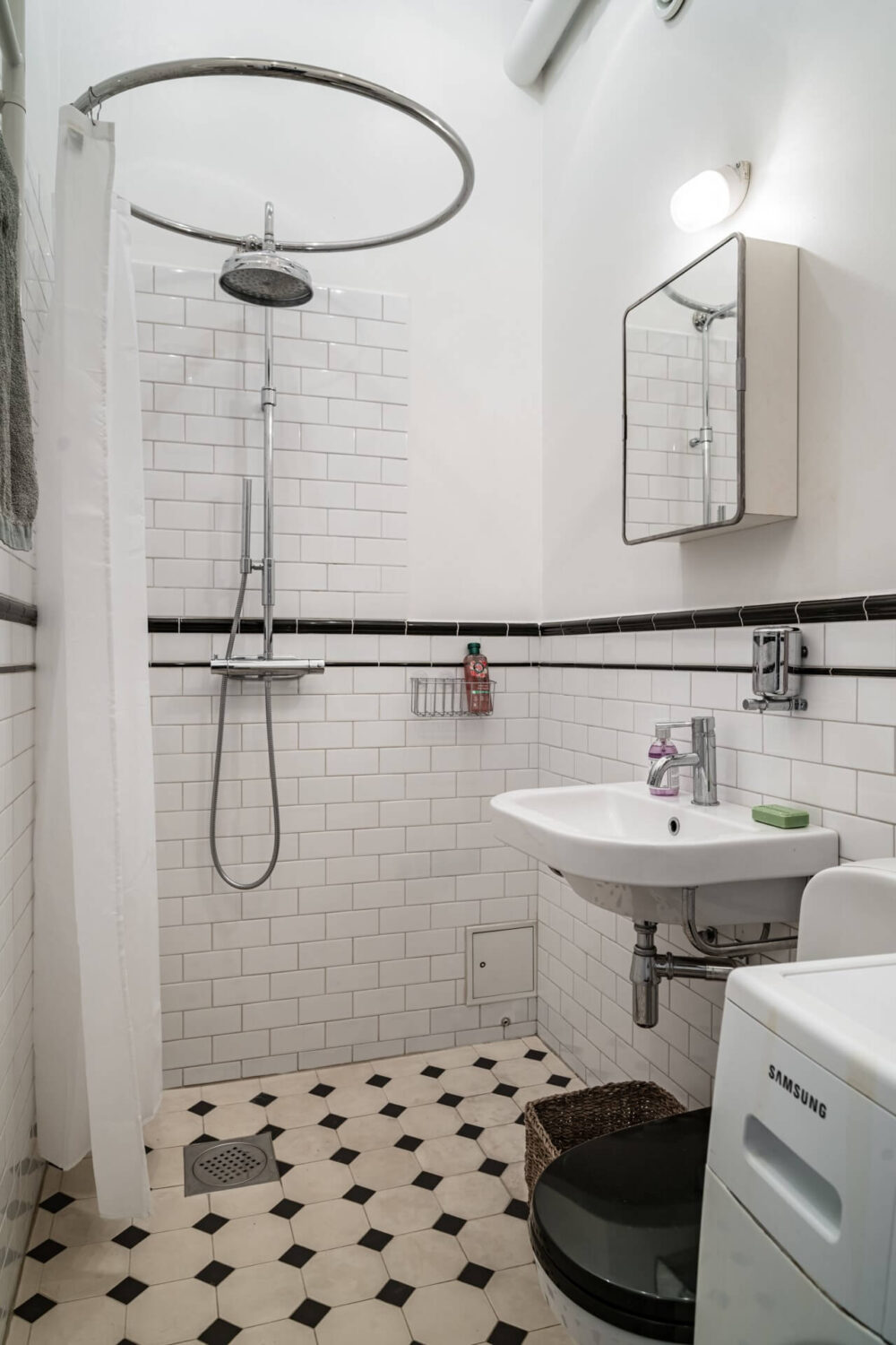 Muted Tones, Art, and Books in a Charming Stockholm Apartment 19 classic black and white bathroom Muted Tones, Art, and Books in a Charming Stockholm Apartment
