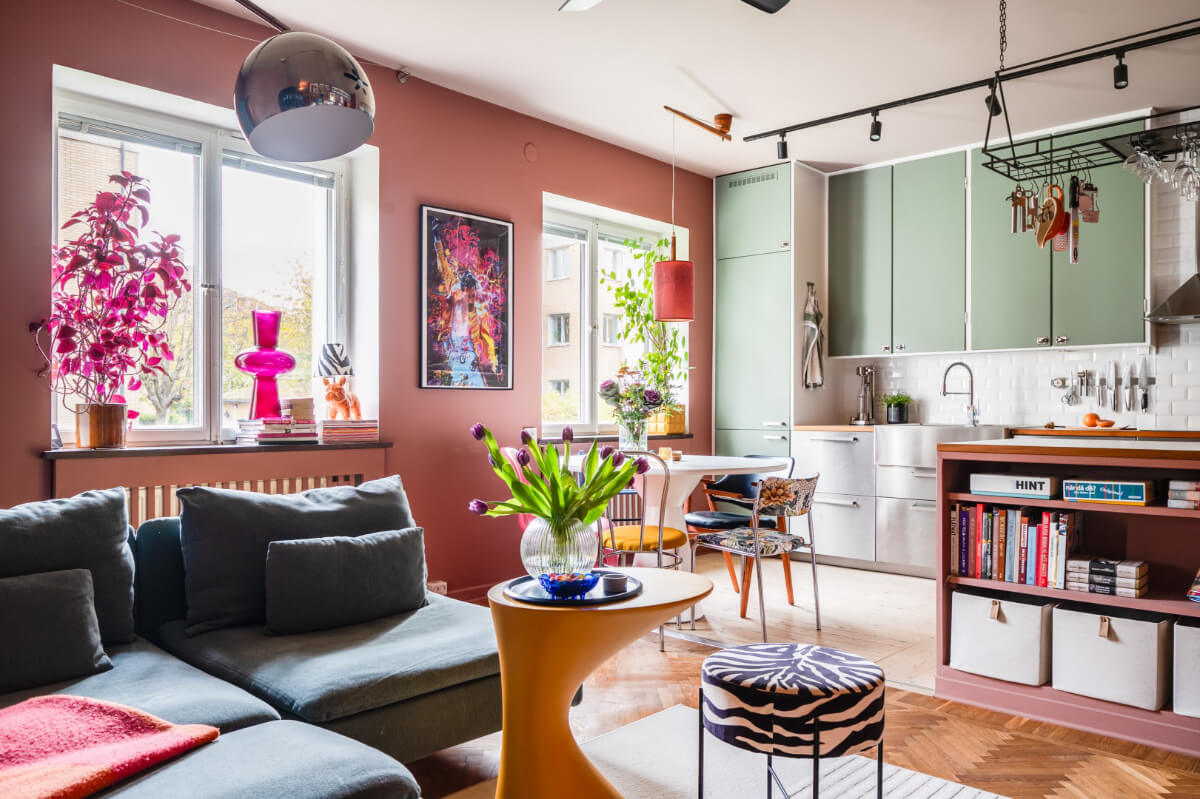 A Vibrant, Colorful Midcentury Apartment in Malmö 1 colorful open plan living room and kitchen