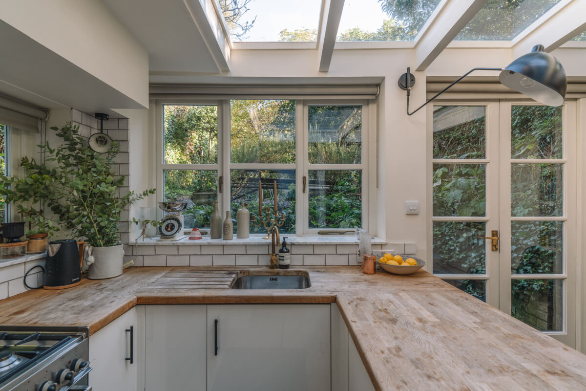 A Charming Garden Apartment in North Kensington 8 kitchen with wooden countertop