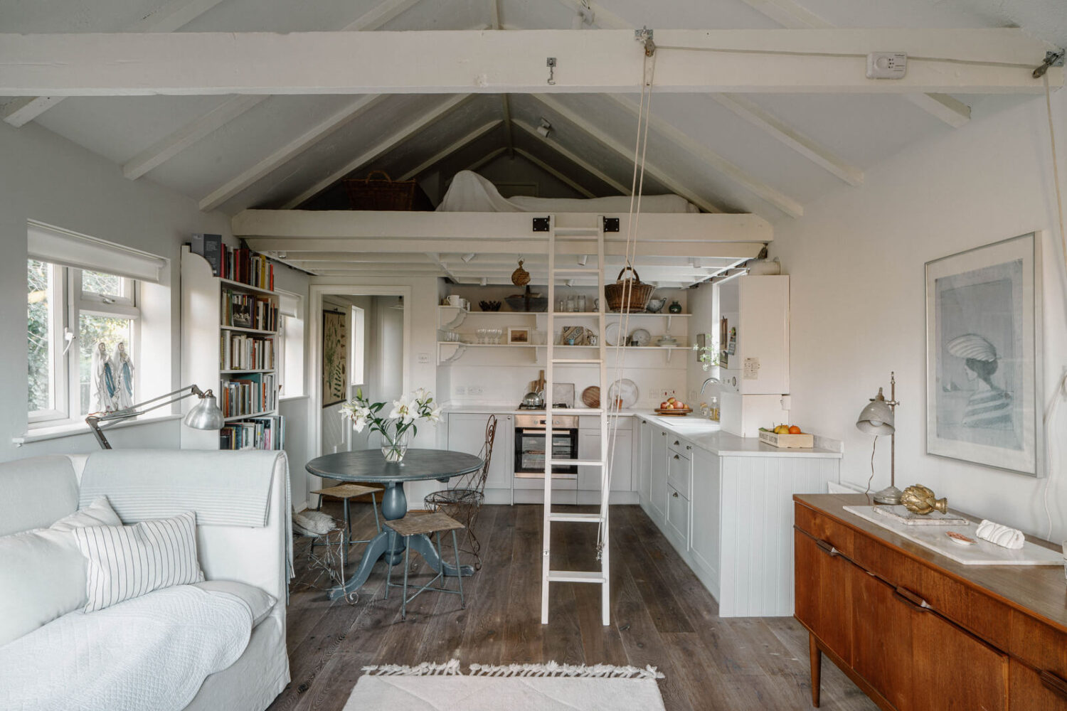 london studio with pitched roof and loft bed