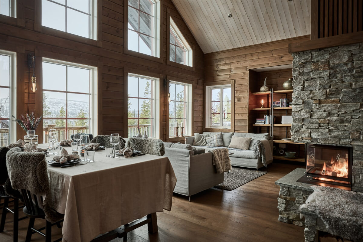 A Warm and Inviting Mountain House in Sweden 1 open plan living space with pitched ceiling A Warm and Inviting Mountain House in Sweden