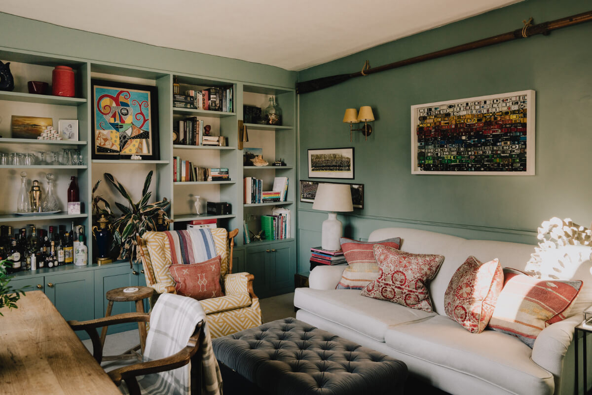 Countryside Charm in a London Apartment in a Former Ale House 2 small green living room with bookcases