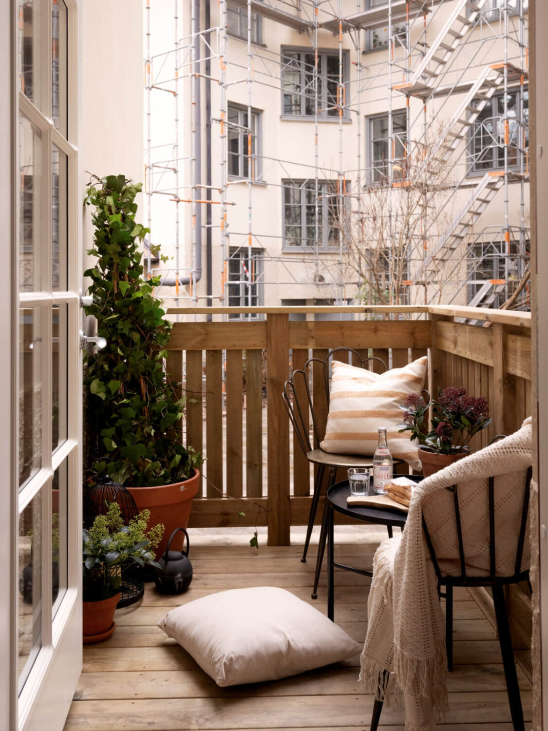 A Calm and Contemporary Apartment in a Former Office Space 14 small wooden courtyard terrace