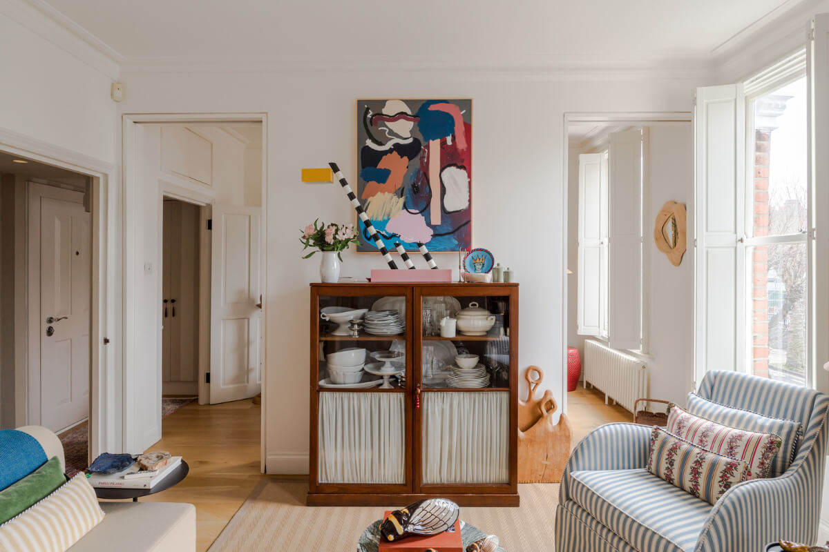 Cozy Contemporary Spaces in a Light-Filled Victorian Apartment 10 antique glass cabinet
