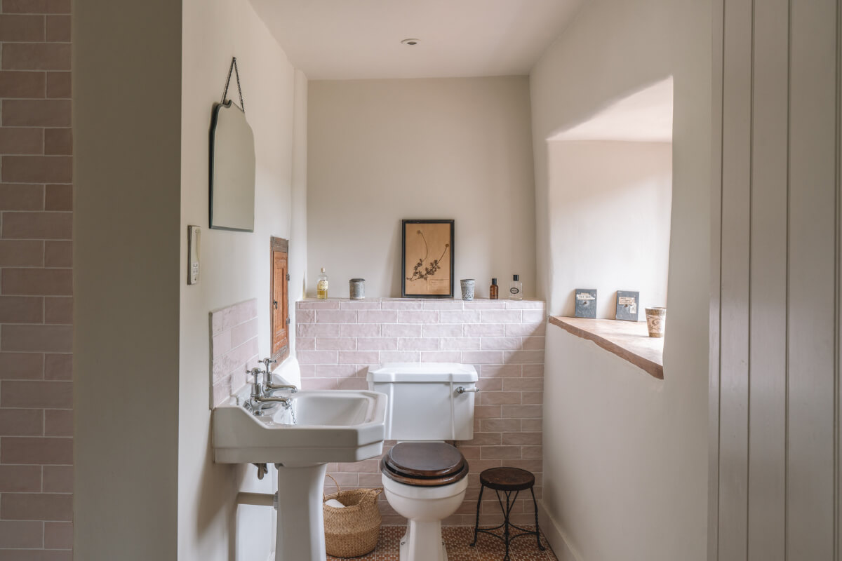 A Beautiful Renovated Country House in England 15 bathroom light pink tiles