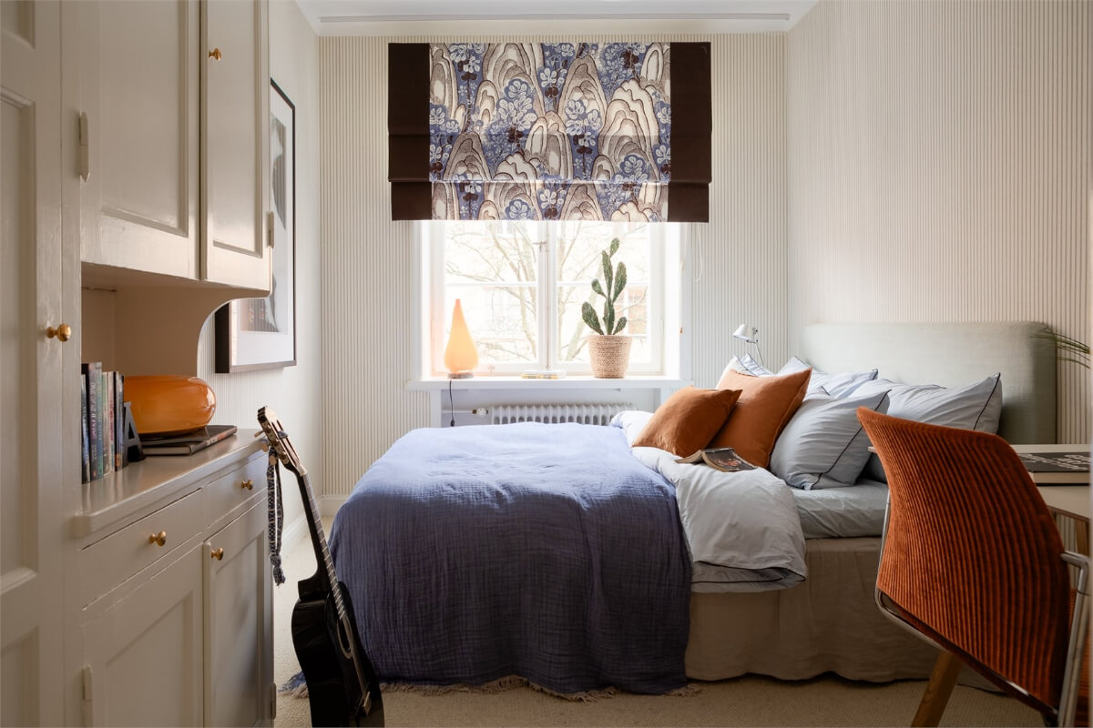 A Light-Filled Two Bedroom Apartment in Stockholm 16 bedroom blue color accents