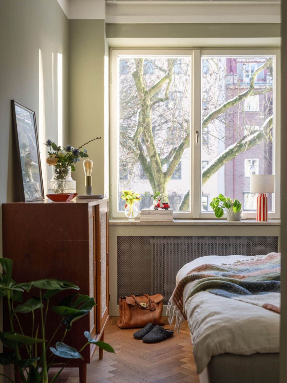 A Light, Renovated Two-Bedroom Apartment in Stockholm 14 bedroom dark parquet floor