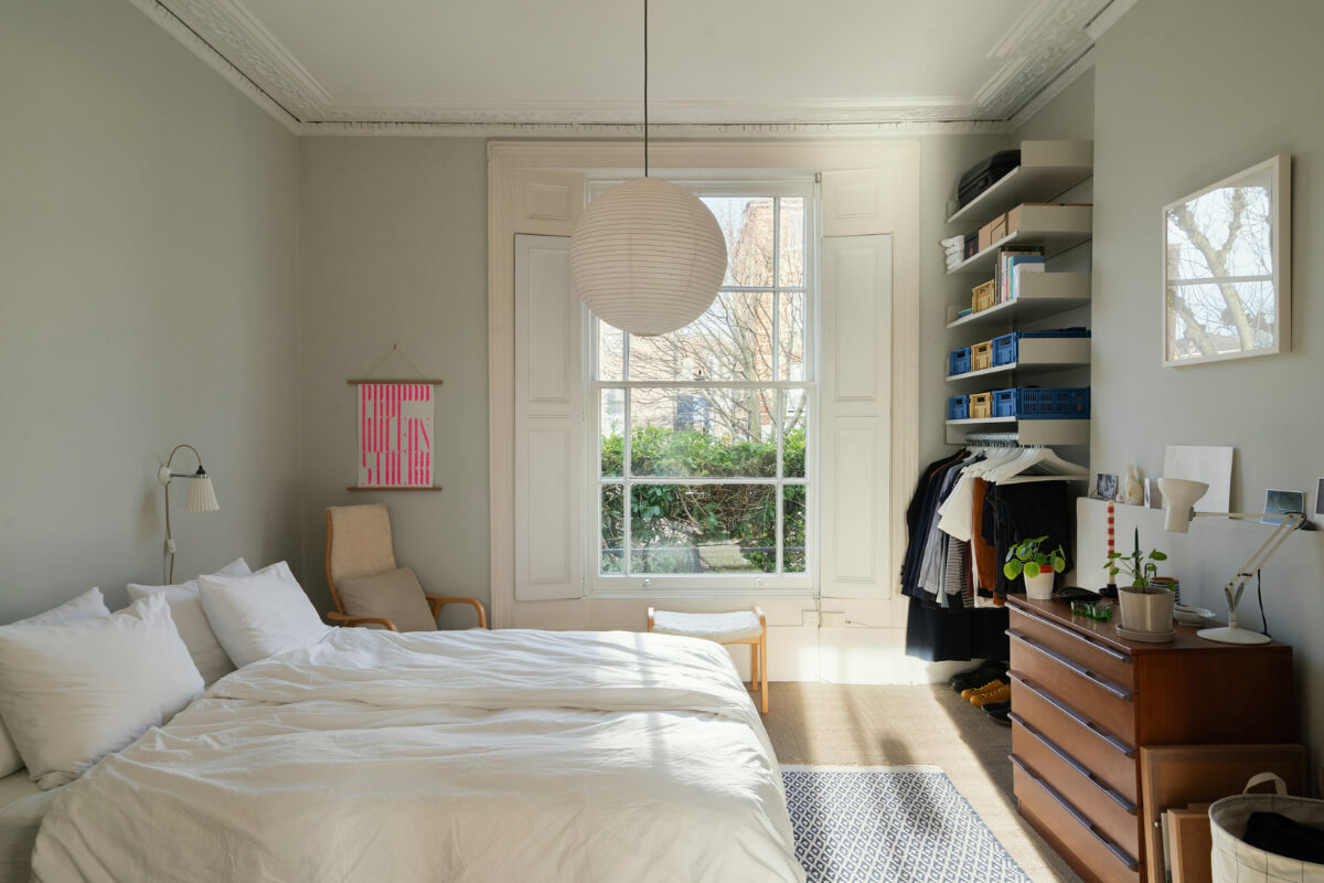 A Light One-Bedroom Apartment in a Victorian Terrace House 13 bedroom light gray walls open wardrobe
