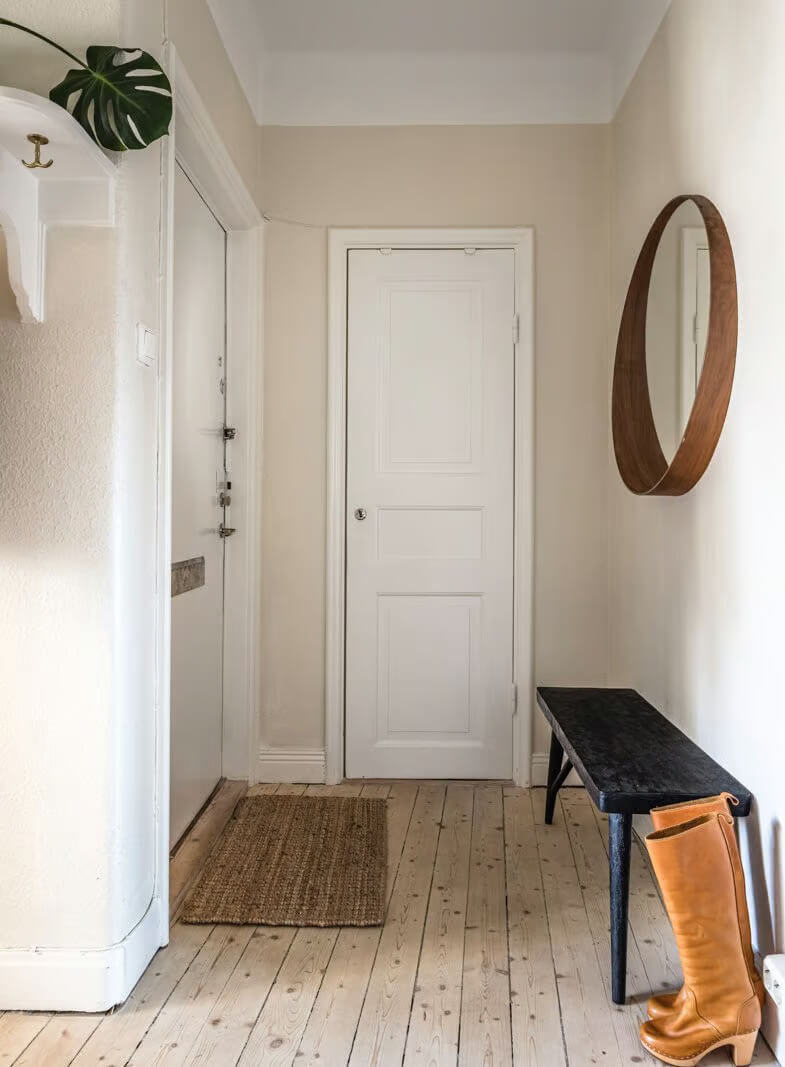 A Beige Studio Apartment with a Bright Kitchen 13 beige hallway wooden floor