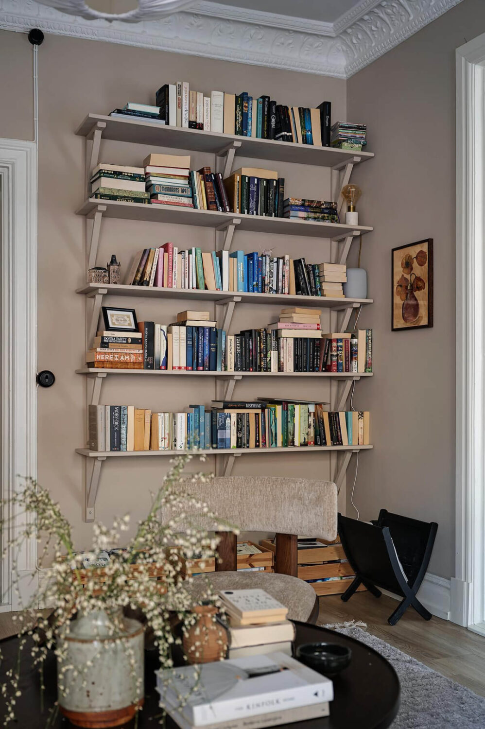 Warm and Inviting Rooms in a Renovated Swedish Apartment 9 bookshelves