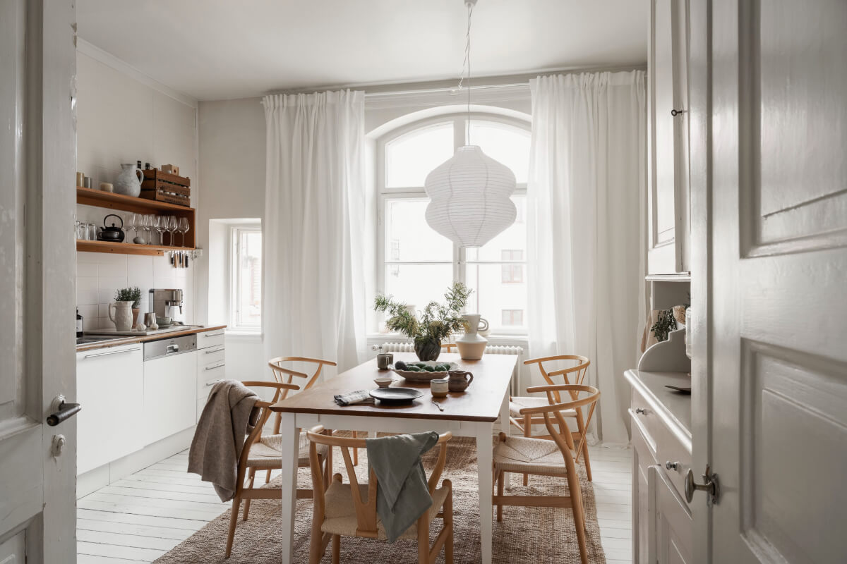 A Stylish Studio Apartment with Period Features and Large Windows 13 bright kitchen white floorboards