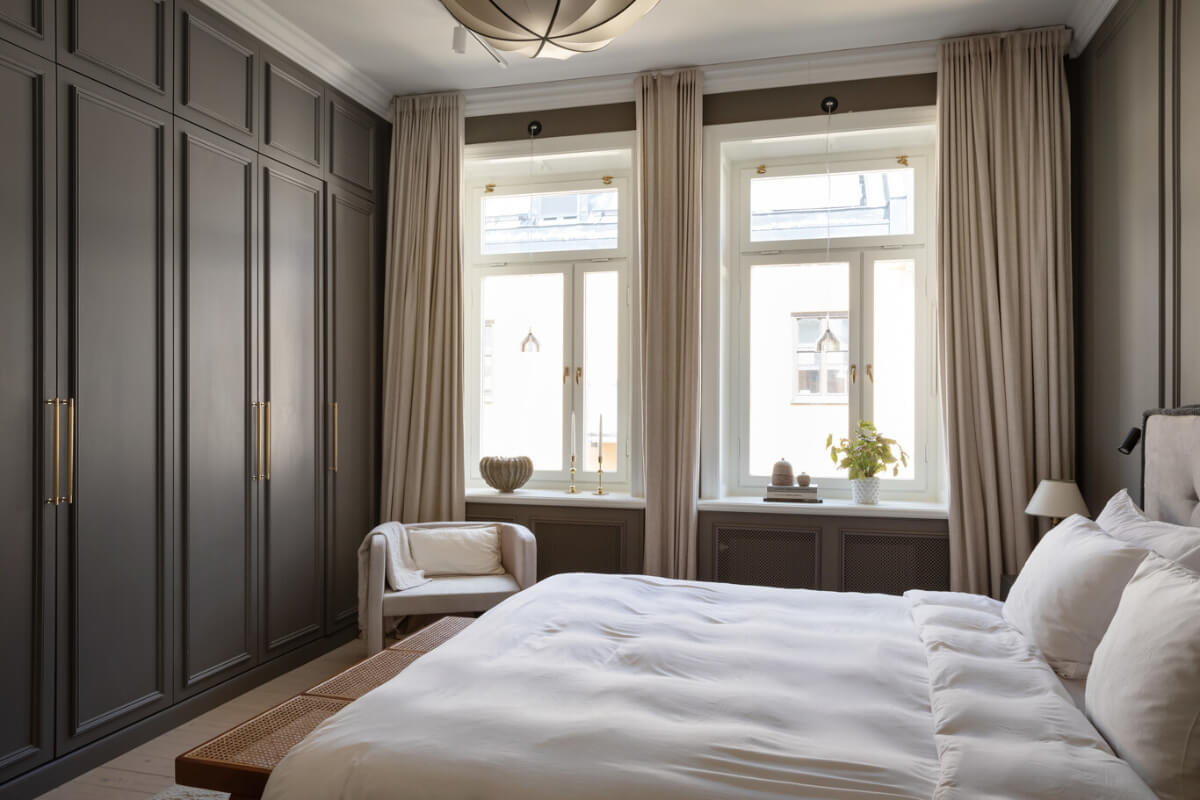 A Calm, Neutral Color Palette in a Classic Swedish Apartment 18 calm master bedroom wardrobe wall