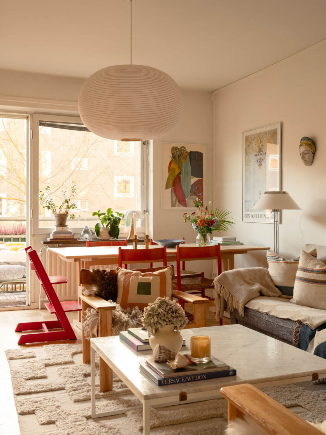 A Charming Midcentury Apartment with a Reading Room 2 dining table in living room