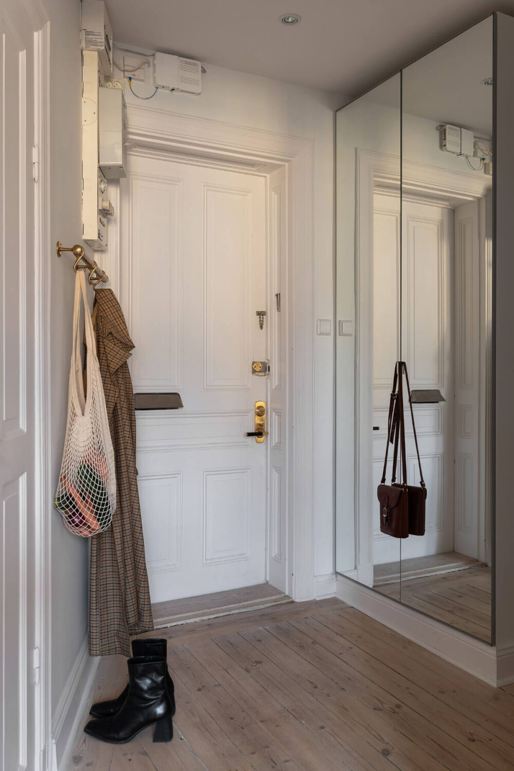 A Small Light Gray Apartment with Period Features 24 hall with mirror door wardrobes