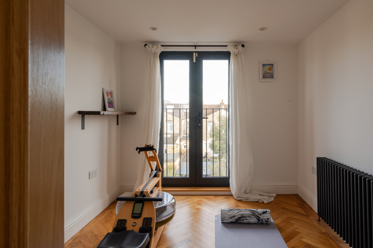 A Restored Victorian House with Exposed Brick and a Kitchen Extension 20 home gym herringbone floor
