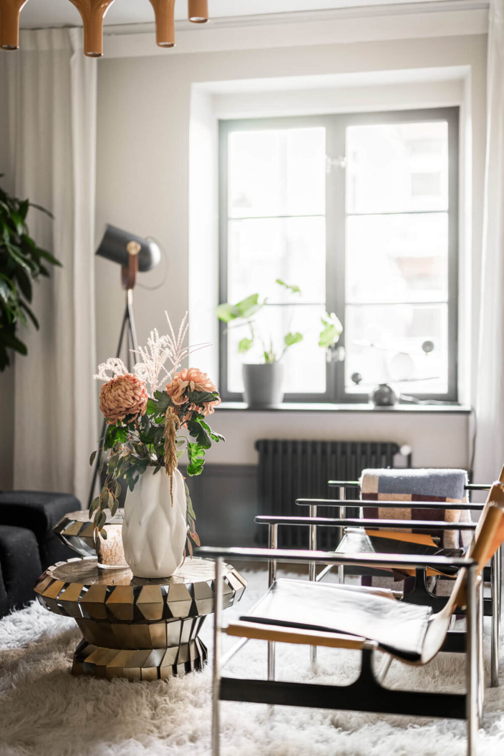 A Swedish Apartment with Exclusive Materials and Monochrome Color Scheme 2 living room detail coffee table