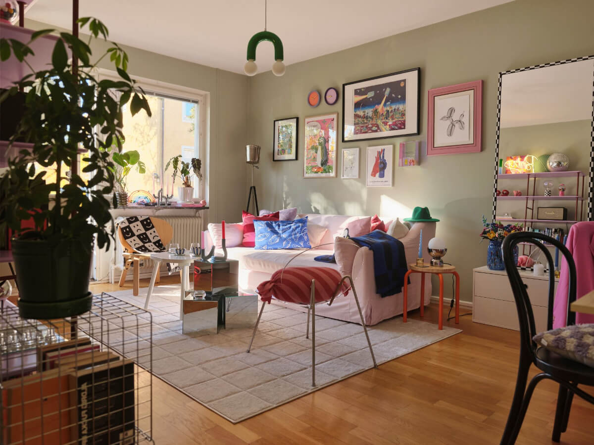 A Midcentury Swedish Apartment with Bright Color Accents 1 living room with colorful home accessories