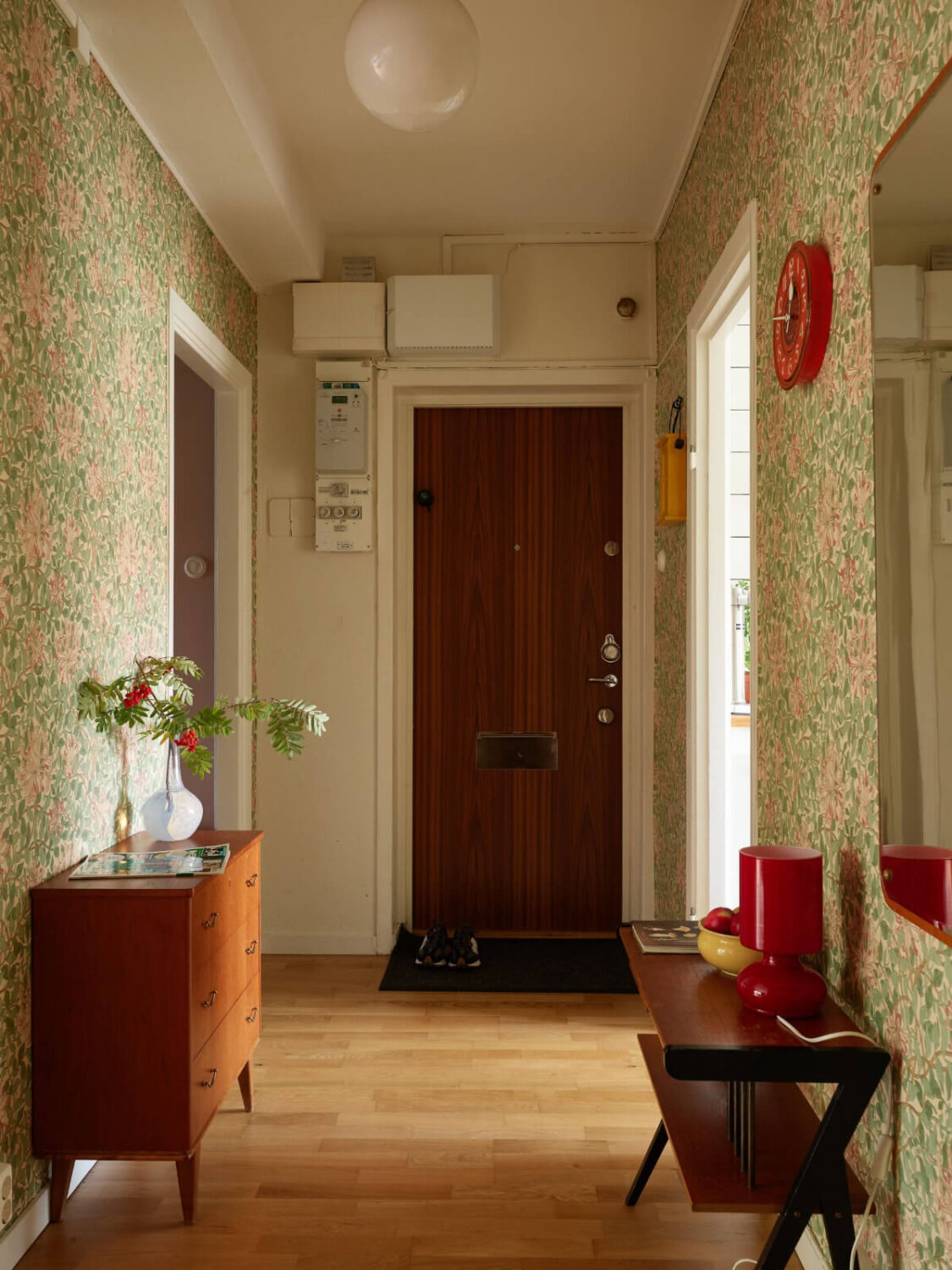 A Charming Midcentury Apartment with Original Features 22 midcentury hall with wallpaper