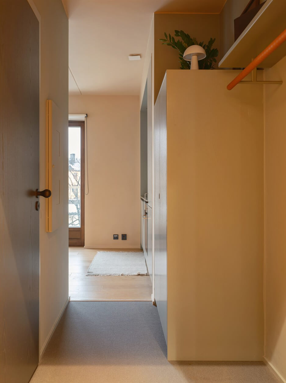 A Small Modern Stockholm Apartment with Smart Storage Solutions 20 open hall coat rack
