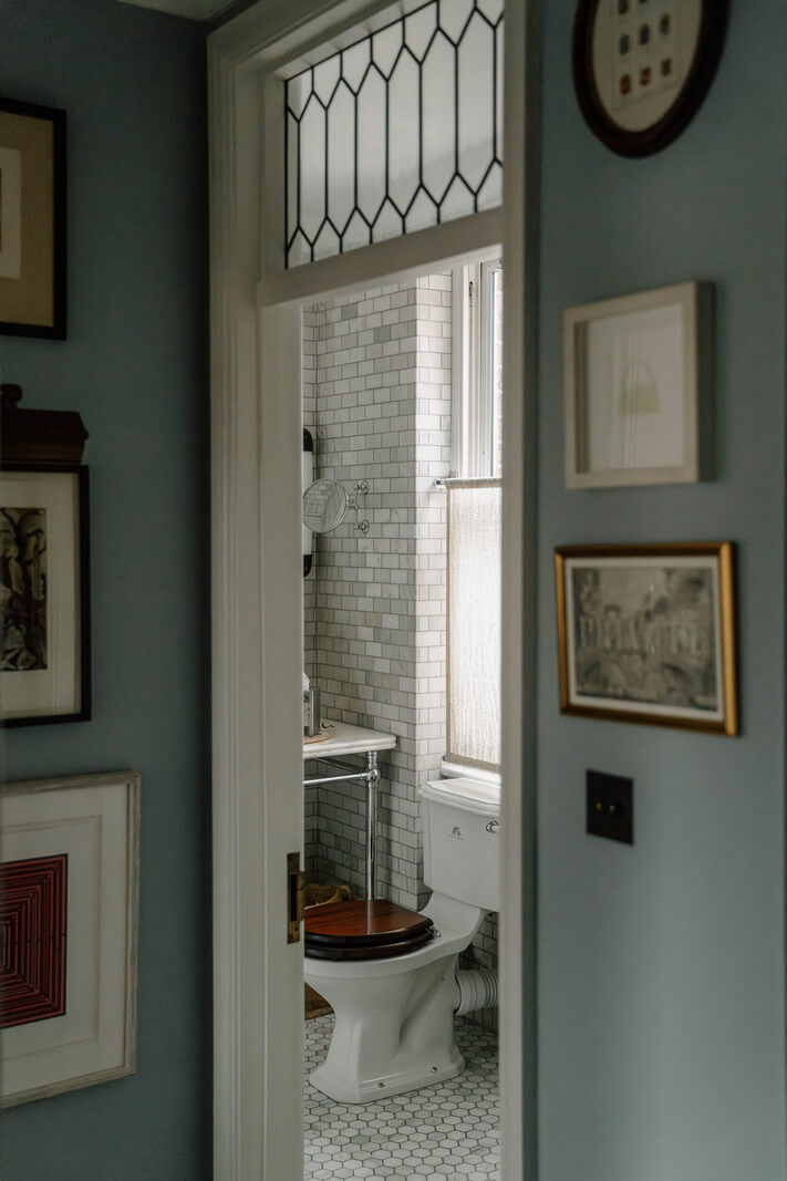 A Cozy Art-Filled Attic Apartment in London 13 peek into bathroom
