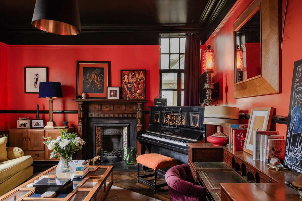 A Grand Victorian Villa in Manchester with Bold Interiors 1 red sitting room with black ceiling nordroom