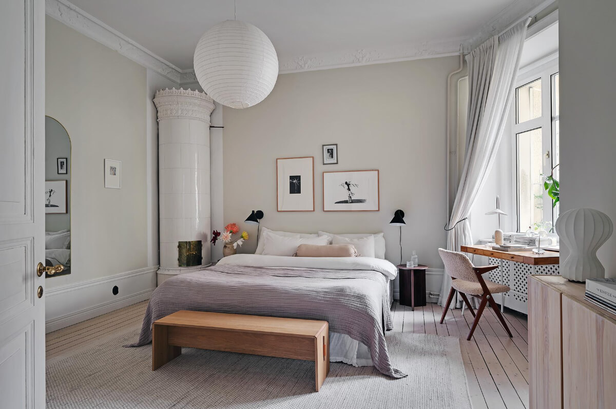Period Features and Modern Materials in a Swedish Apartment 17 serene bedroom desk under window