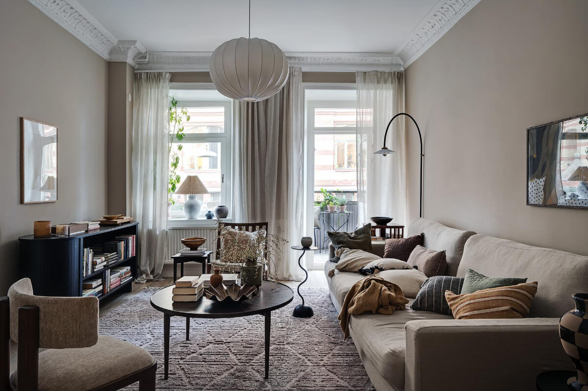 Warm and Inviting Rooms in a Renovated Swedish Apartment 3 warm scandinavian living room