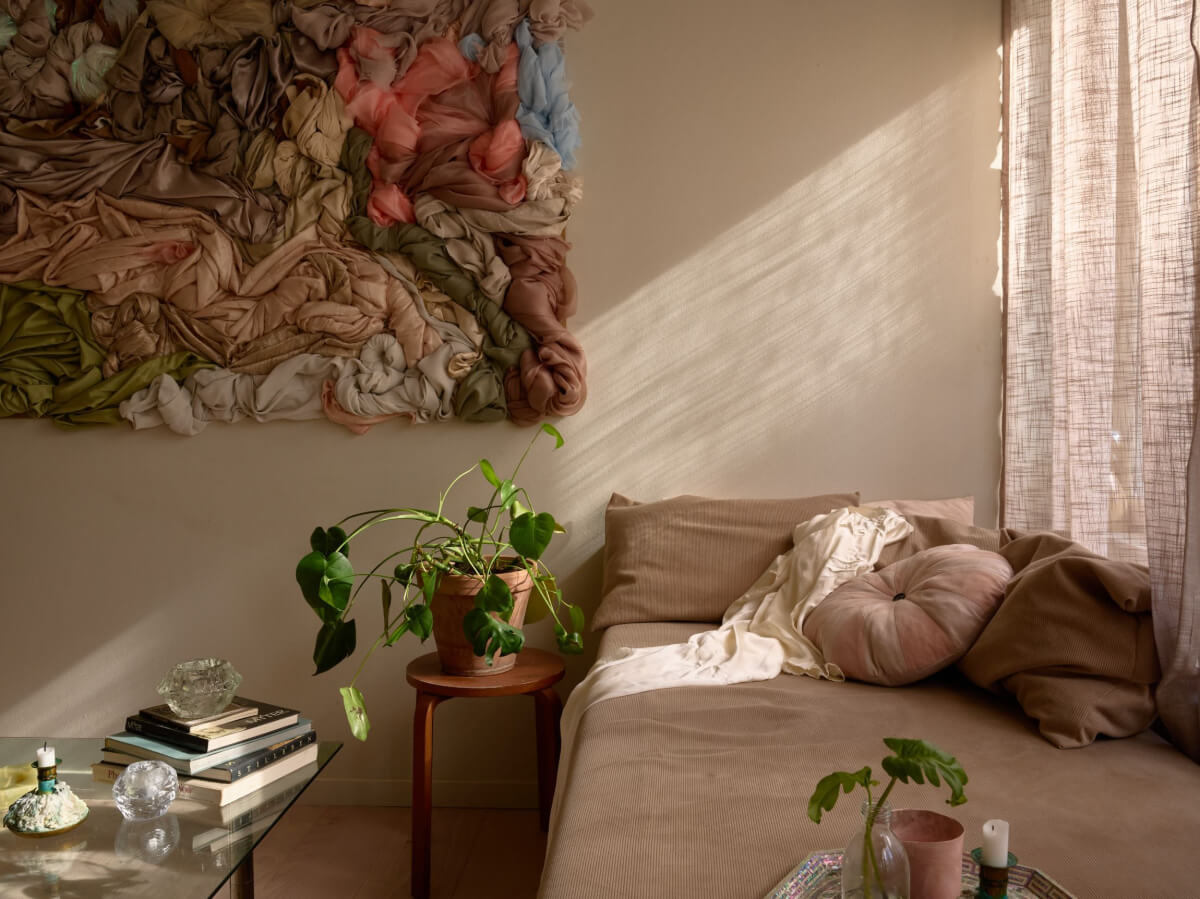 High Ceilings in a Small Swedish Loft Designed for a Family 11 window seat