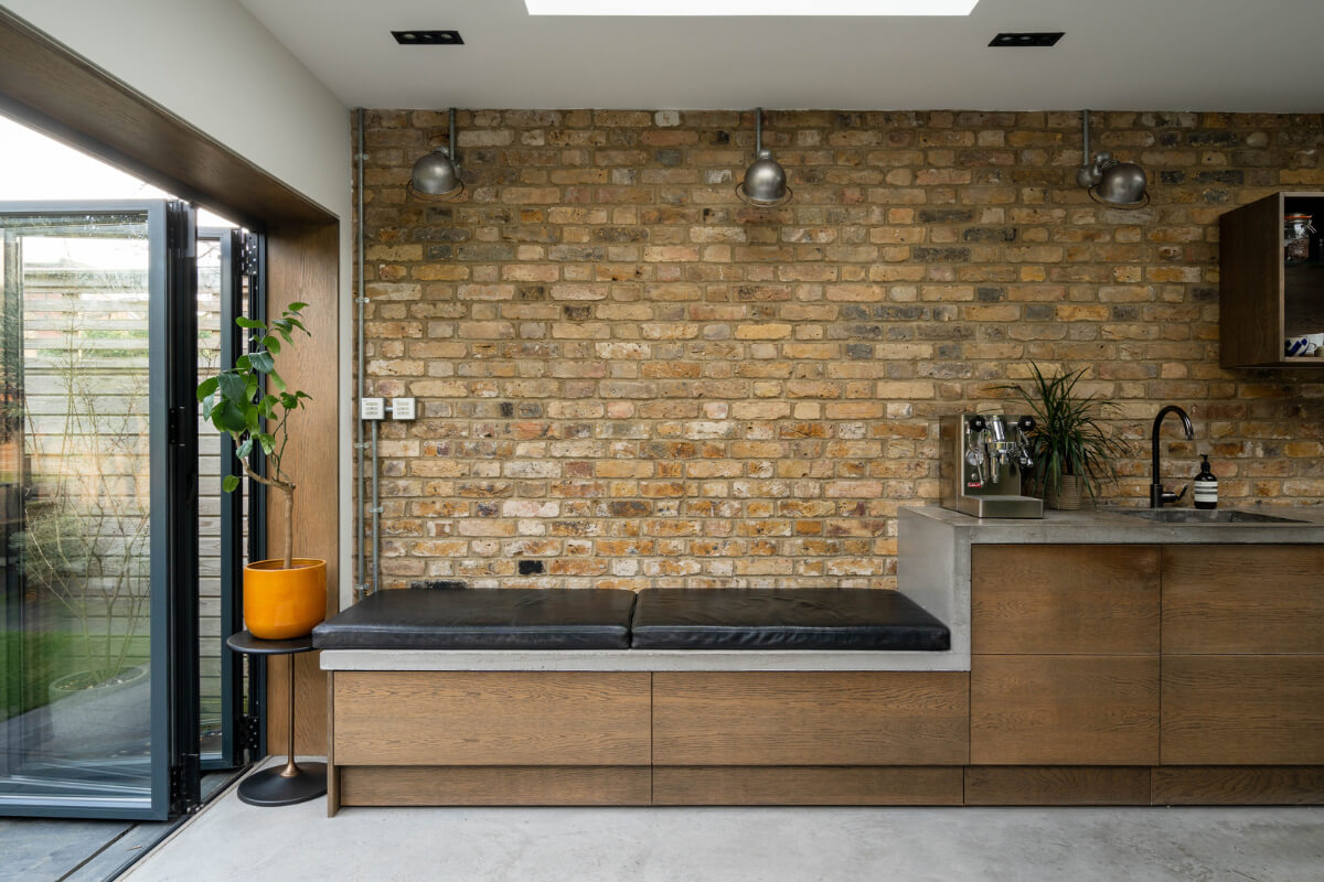 A Restored Victorian House with Exposed Brick and a Kitchen Extension 10 window seat brick wall
