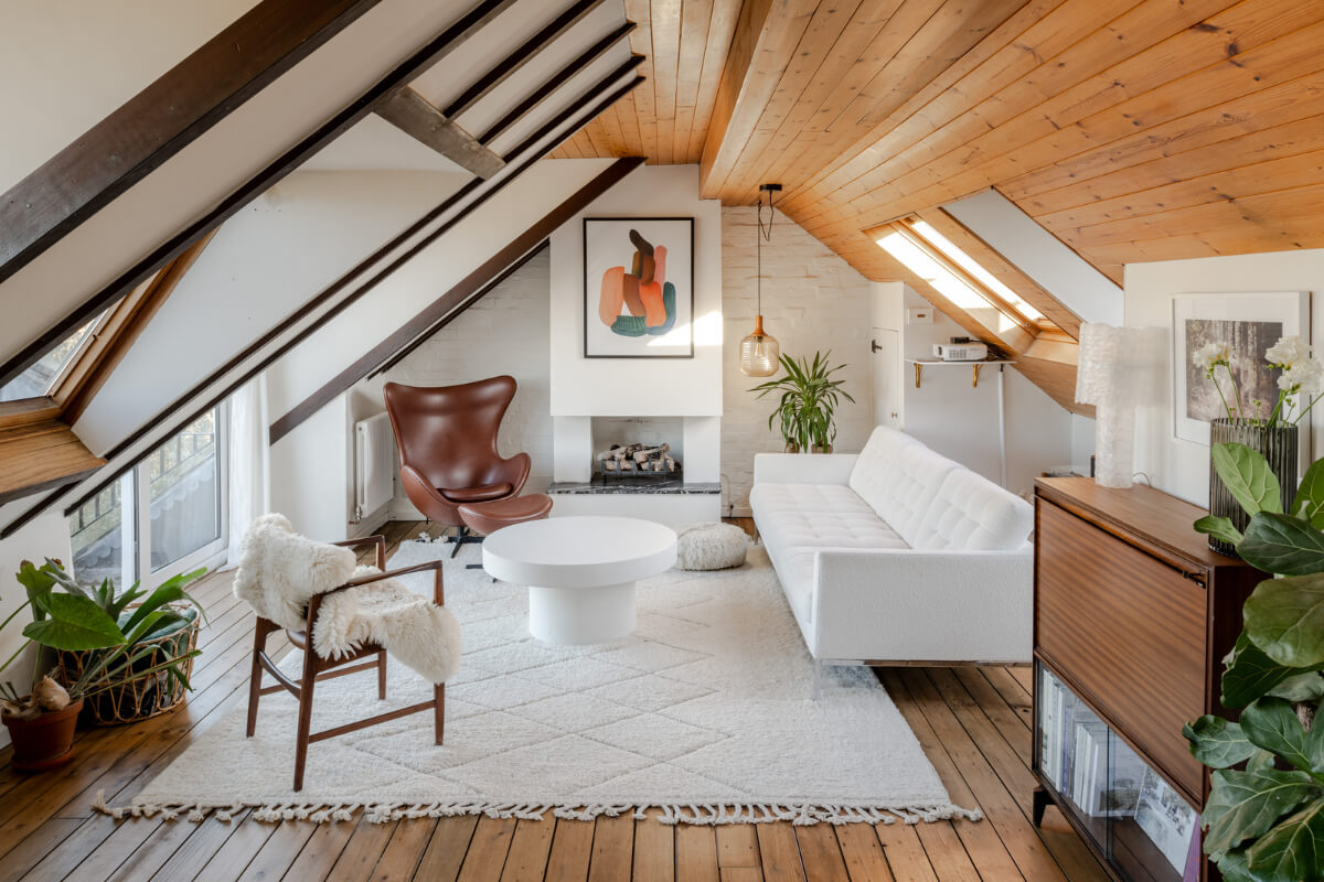 A Light Duplex Apartment in an Arts and Crafts Building 1 attic living room wooden ceiling white painted brick