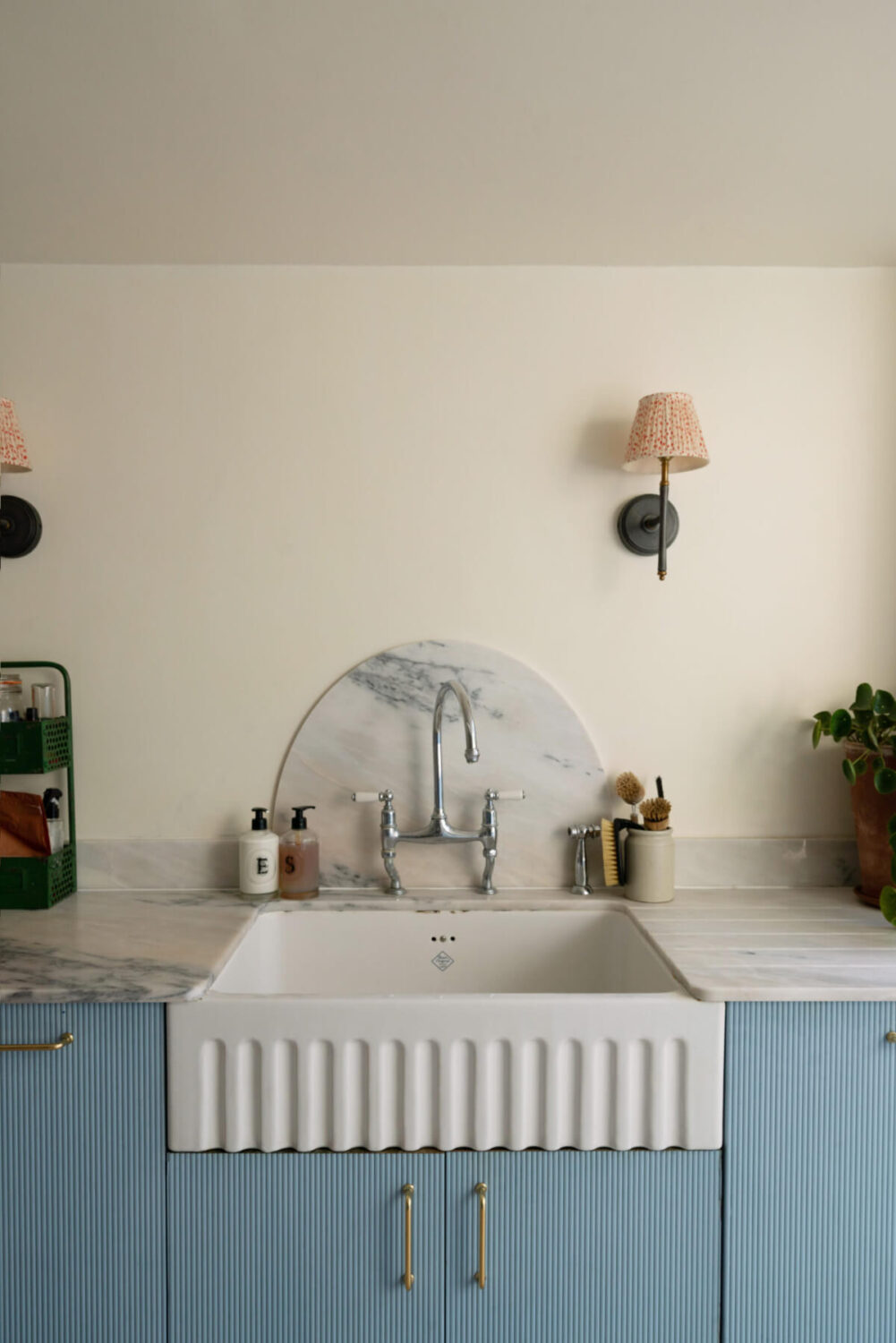 A Bright Victorian House with Plaster Walls and Blue Rooms 9 blue kitchen marble countertop