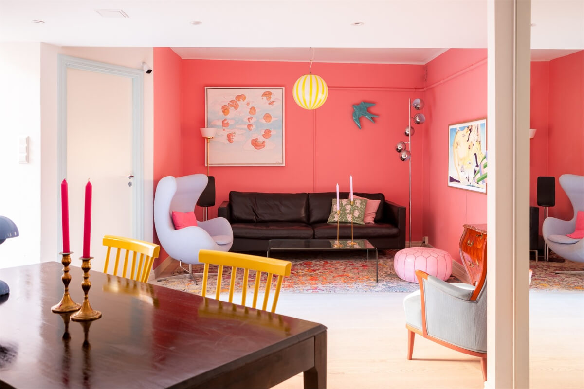 A Colorful Basement Duplex Apartment in Stockholm 2 coral pink living room