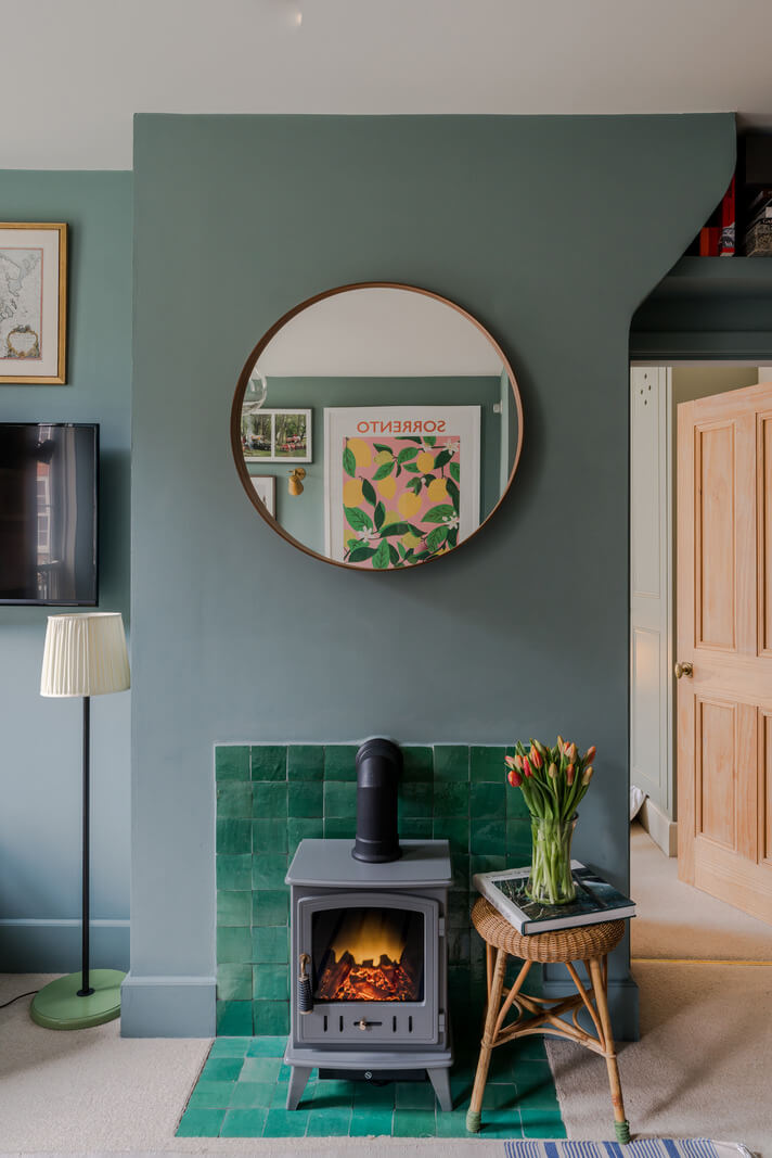 A Calm & Stylish Color Palette in a Small London Apartment 6 emerald green fireplace tiles