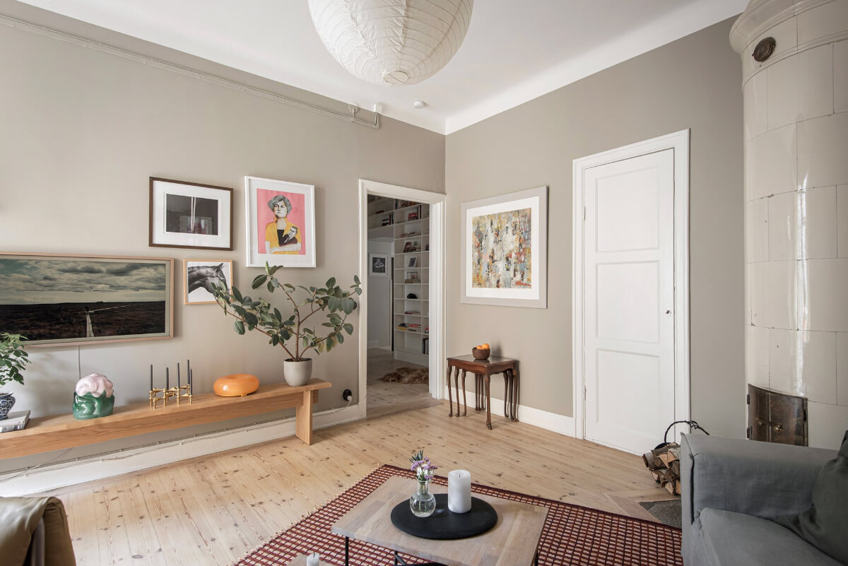 Rooms with Unique Shapes in a Lovely Swedish Apartment 10 gray living room wooden floor