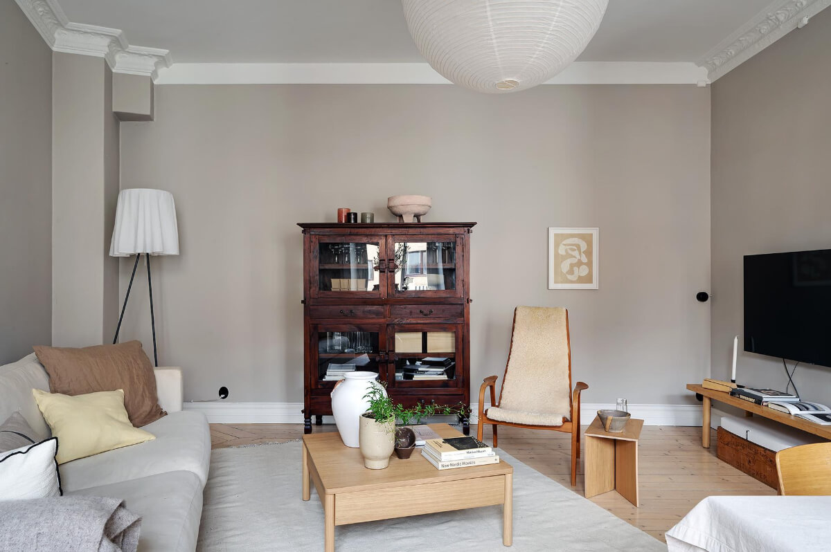 A Gothenburg Apartment with a Small Dark Green Bedroom 4 gray walls living room stucco